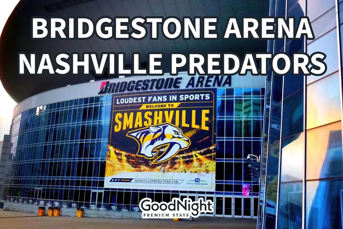 An exterior shot of Bridgestone Arena, adorned with the bold 'Welcome to Smashville' banner and the Nashville Predators logo, bustling with energy and anticipation for events.